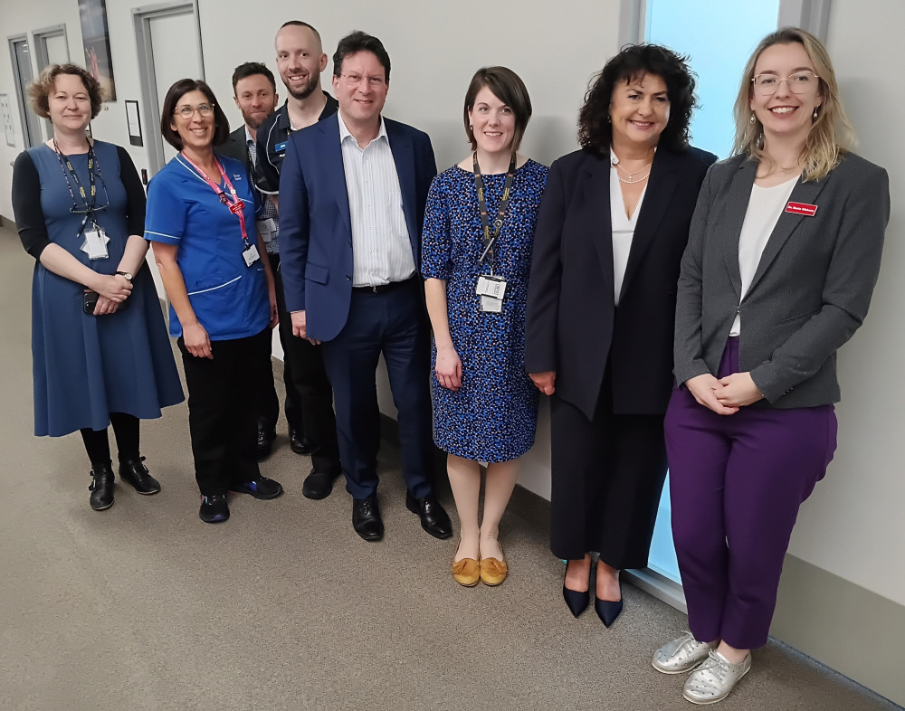 POPS team and other clinical specialists with the Minister