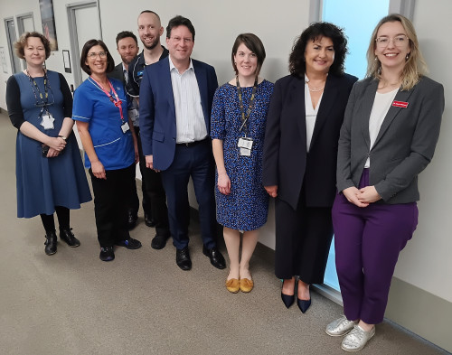 POPS team and other clinical specialists with the Minister