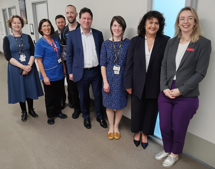 POPS team and other clinical specialists with the Minister